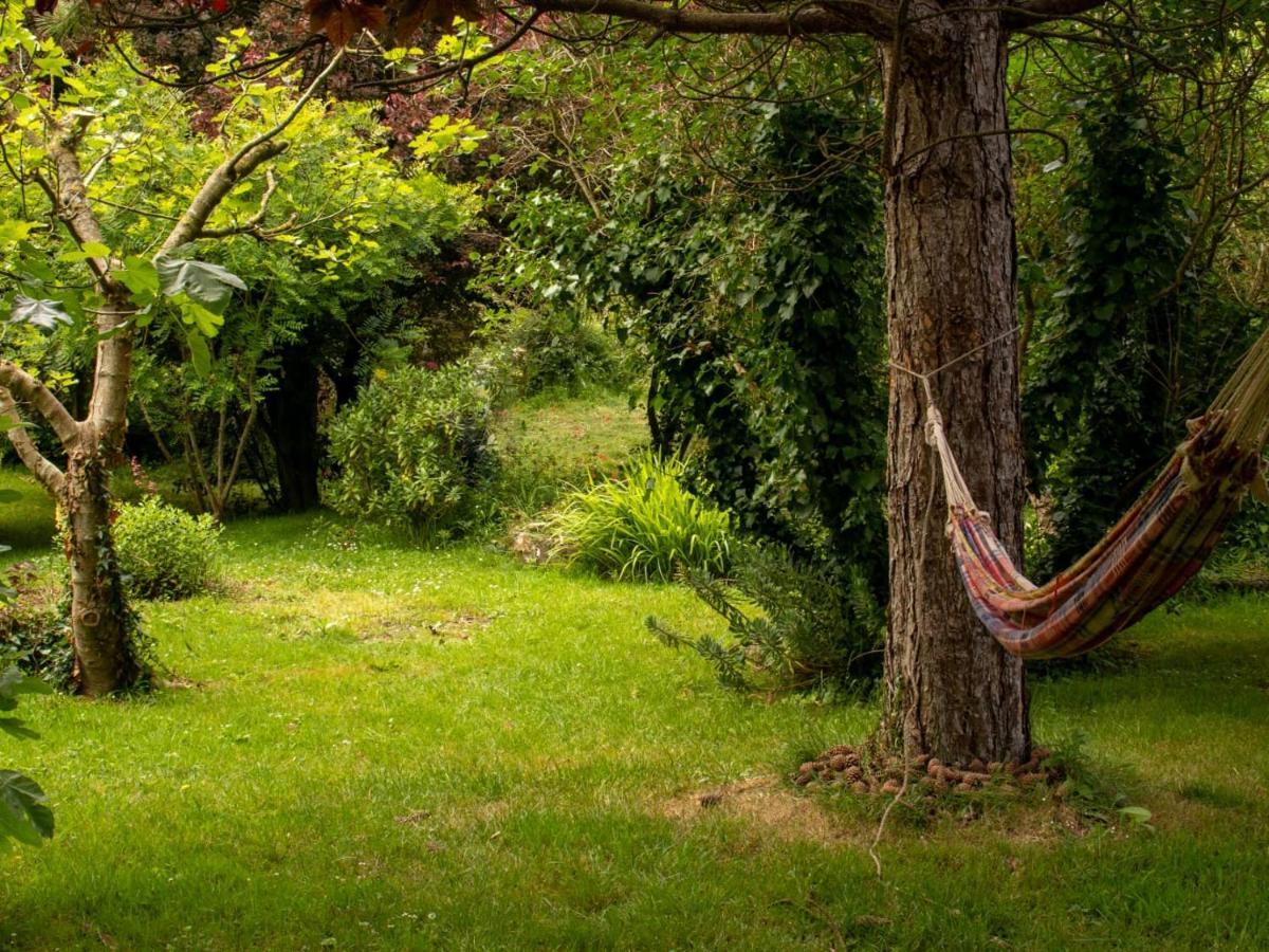 Une Suite Au Jardin Hyenville Exteriör bild